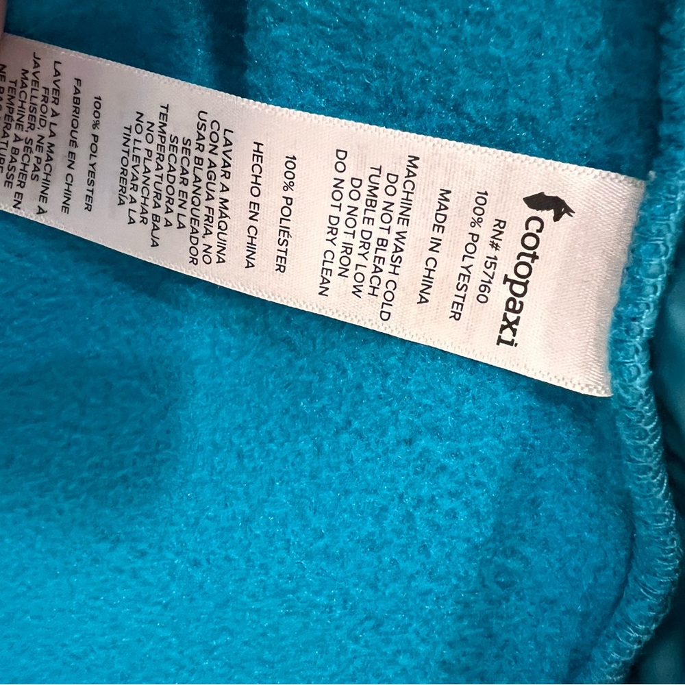 cotopaxi Teal Fleece Jacket with Brown, Orange, and Purple Stripes - Picture 3 of 5